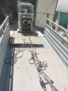winching-press-onto-trailer